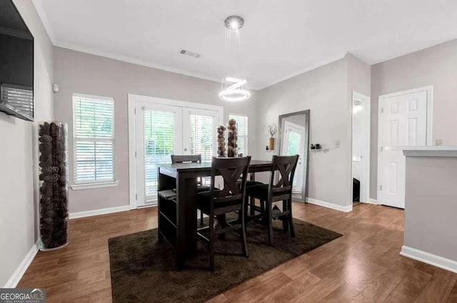 1731 Pryor Rd SW Unit 108, Atlanta, GA 30315 - dining space featuring french doors, wood finished floors, ornamental molding, a chandelier, and baseboards