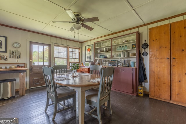207 County Road 561, Woodland, AL 36280 - dining space with dark wood-style floors, ornamental molding, and a ceiling fan