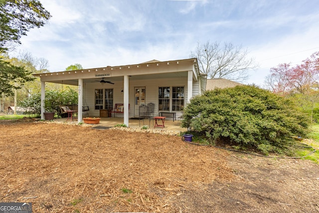 207 County Road 561, Woodland, AL 36280 - rear view of house with a ceiling fan and a patio area