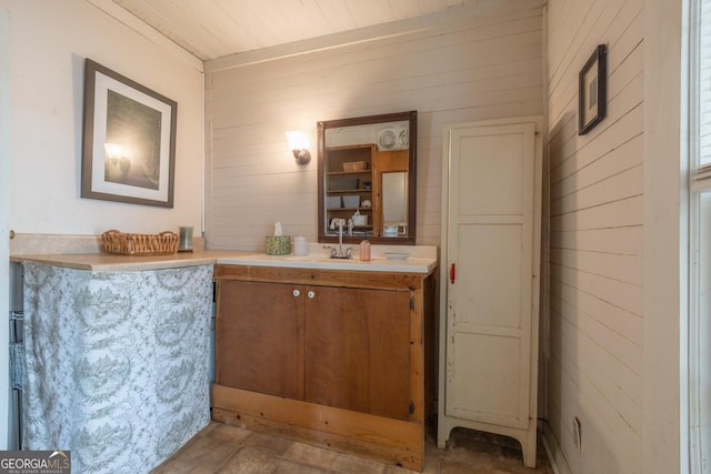 207 County Road 561, Woodland, AL 36280 - bathroom featuring wood walls and vanity