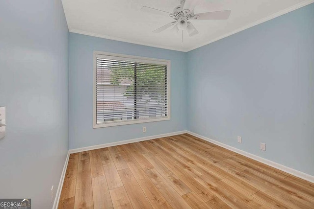 809 Mallery St Unit A, Saint Simons, GA 31522 - spare room featuring baseboards, light wood finished floors, crown molding, and ceiling fan