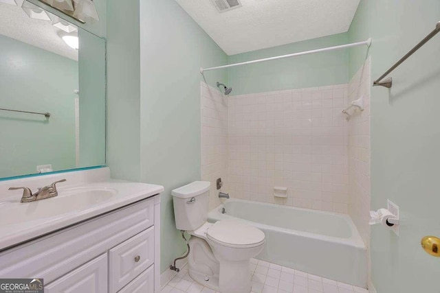 809 Mallery St Unit A, Saint Simons, GA 31522 - full bathroom with a textured ceiling, vanity, tile patterned floors, and bathing tub / shower combination