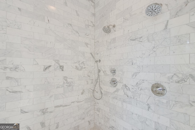 room details with a tile shower