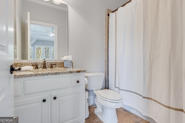 full bath featuring toilet, vanity, curtained shower, and tile patterned flooring
