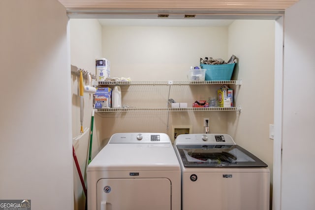 laundry room with laundry area and separate washer and dryer