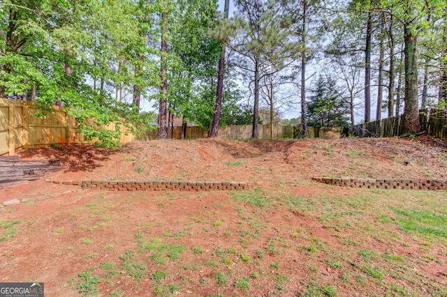 view of yard featuring fence