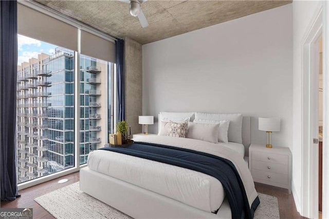 855 Peachtree St NE Unit 2403, Atlanta, GA 30308 - bedroom featuring wood finished floors and ceiling fan