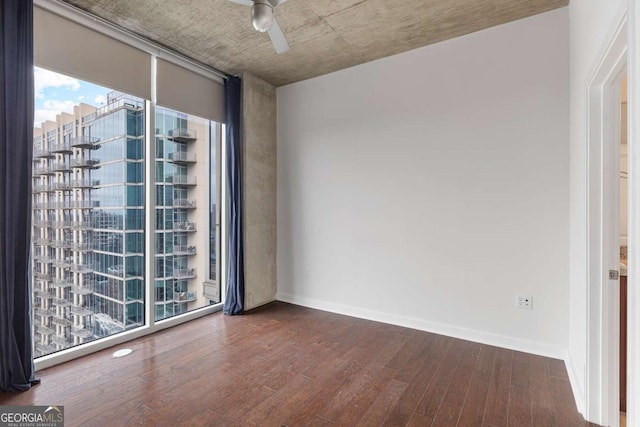 855 Peachtree St NE Unit 2403, Atlanta, GA 30308 - unfurnished room featuring wood finished floors and ceiling fan