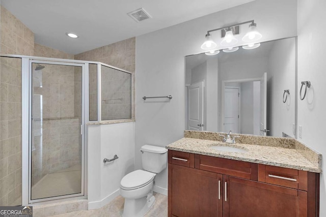 855 Peachtree St NE Unit 2403, Atlanta, GA 30308 - bathroom featuring vanity, a shower stall, and tile patterned flooring