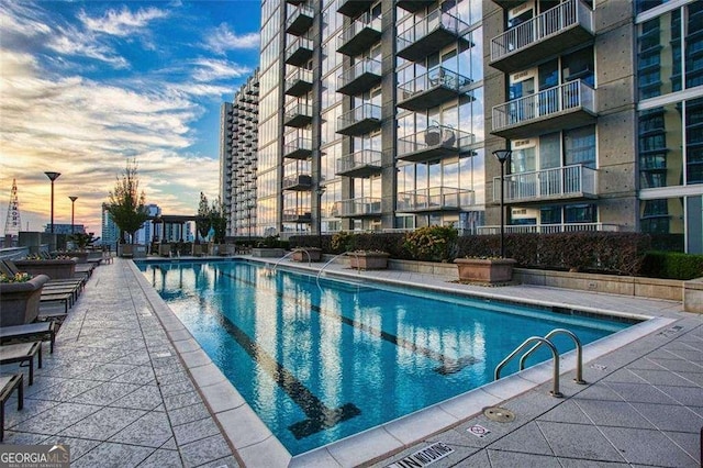 855 Peachtree St NE Unit 2403, Atlanta, GA 30308 - pool at dusk with a community pool