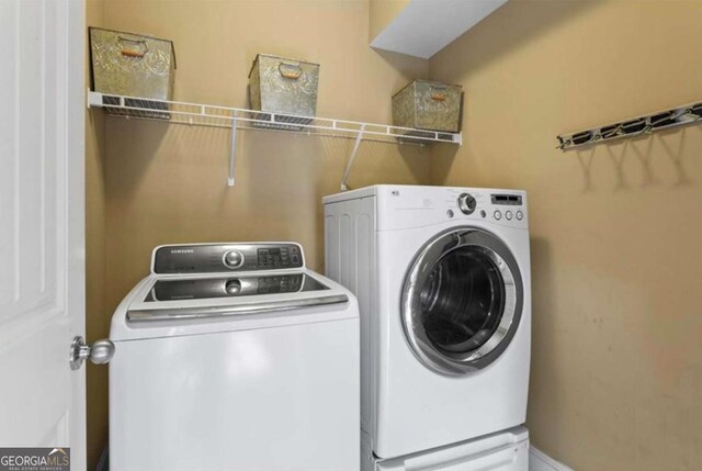 108 Summer Breeze Ln, Canton, GA 30114 - clothes washing area with washer and clothes dryer