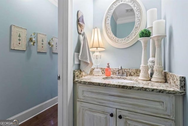 108 Summer Breeze Ln, Canton, GA 30114 - bathroom with wood finished floors, baseboards, vanity, and crown molding