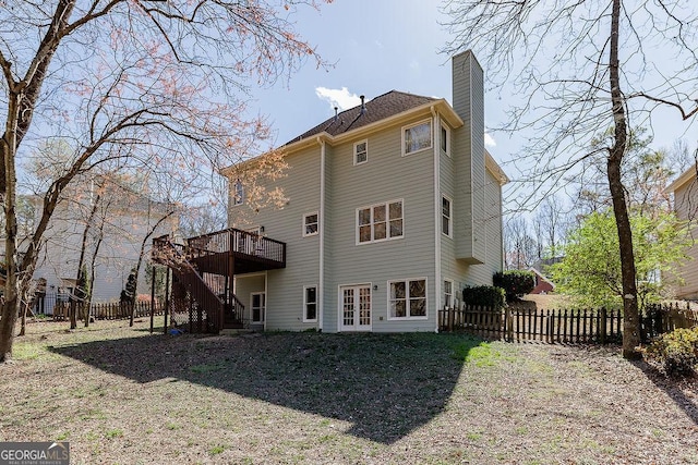 2032 Stonewick Ct, Lawrenceville, GA 30043 - back of property featuring a chimney, a deck, stairs, and french doors