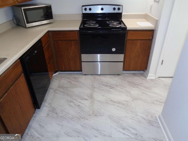 kitchen with marble finish floor, light countertops, stainless steel appliances, and brown cabinetry