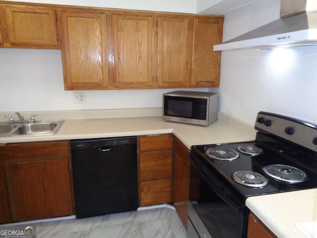 kitchen featuring light countertops, appliances with stainless steel finishes, brown cabinetry, and ventilation hood