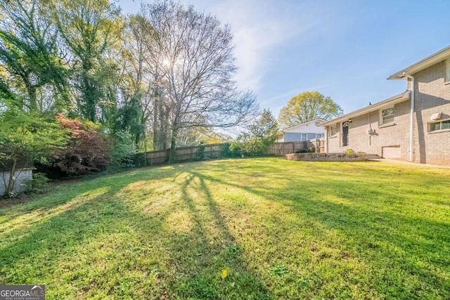 view of yard with fence