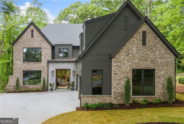402 Chattahoochee St, Roswell, GA 30075 - view of front of home featuring brick siding and a front lawn