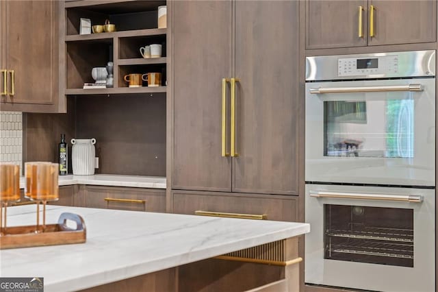402 Chattahoochee St, Roswell, GA 30075 - kitchen with stainless steel double oven, open shelves, and decorative backsplash