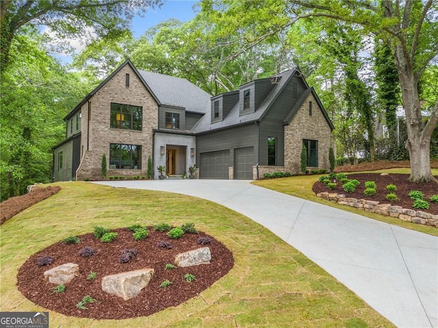 402 Chattahoochee St, Roswell, GA 30075 - view of front facade featuring an attached garage, concrete driveway, brick siding, and a front yard