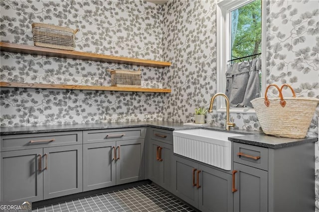 402 Chattahoochee St, Roswell, GA 30075 - kitchen with open shelves, wallpapered walls, gray cabinets, and dark countertops