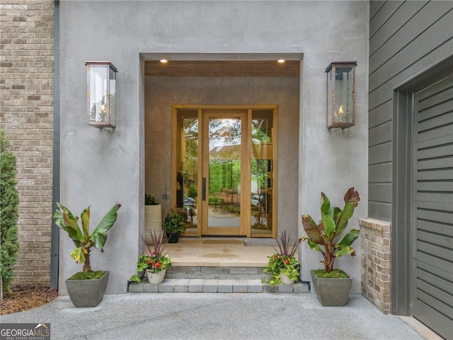 402 Chattahoochee St, Roswell, GA 30075 - view of exterior entry with stucco siding and french doors