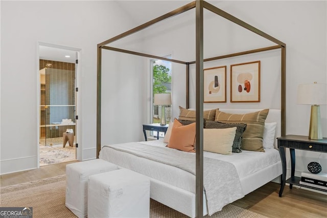 402 Chattahoochee St, Roswell, GA 30075 - bedroom featuring wood finished floors and ensuite bathroom