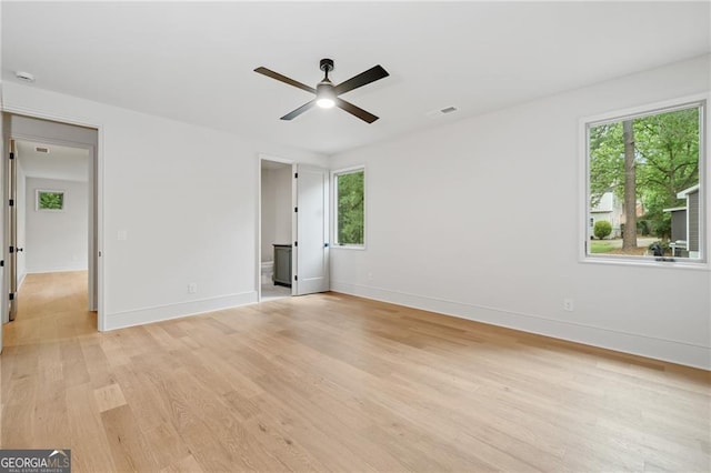 402 Chattahoochee St, Roswell, GA 30075 - unfurnished room featuring a ceiling fan, light wood-style flooring, and healthy amount of natural light