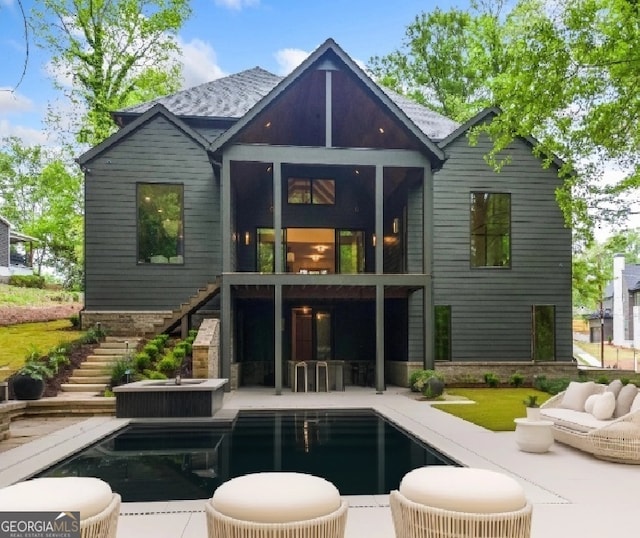 402 Chattahoochee St, Roswell, GA 30075 - rear view of house with stairway, a patio area, an outdoor pool, an outdoor hangout area, and stone siding