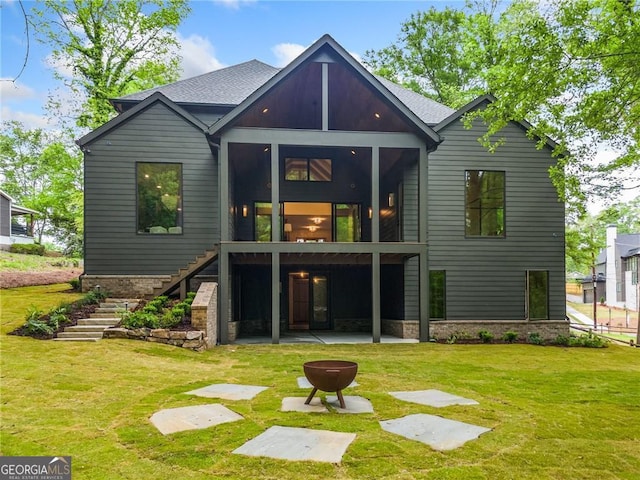402 Chattahoochee St, Roswell, GA 30075 - rear view of house with stairway, a yard, a patio, and a sunroom