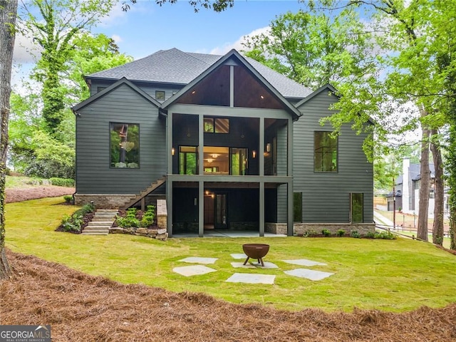402 Chattahoochee St, Roswell, GA 30075 - rear view of property featuring stairway, a yard, a patio area, and a sunroom