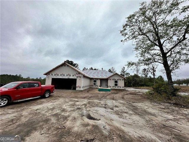 property under construction with a garage