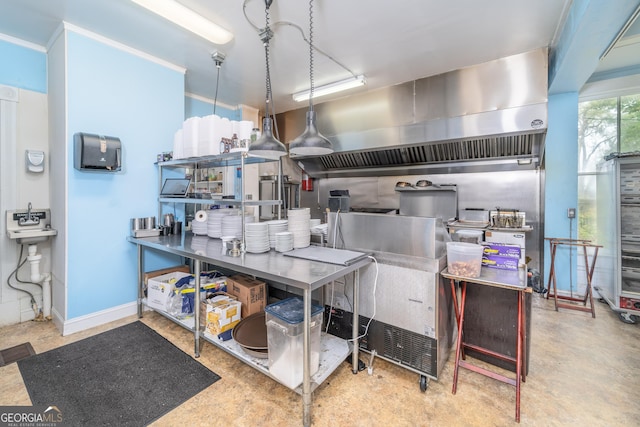 622 Main St, Blackshear, GA 31516 - kitchen with baseboards and concrete flooring