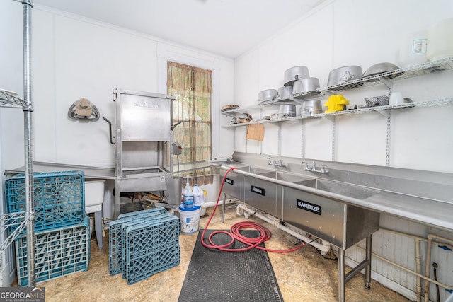 622 Main St, Blackshear, GA 31516 - kitchen with stainless steel countertops, crown molding, and open shelves