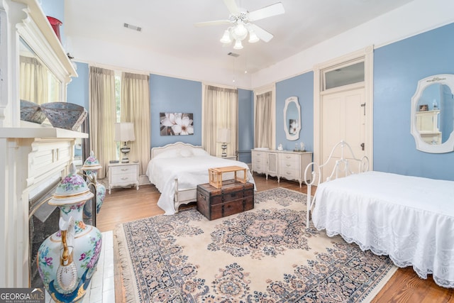 622 Main St, Blackshear, GA 31516 - bedroom featuring wood finished floors, ceiling fan, and visible vents