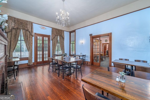 622 Main St, Blackshear, GA 31516 - dining room with a chandelier, french doors, and hardwood / wood-style floors