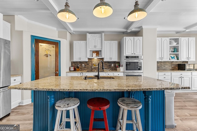 1452 Redwine Rd, Fayetteville, GA 30215 - kitchen with open shelves, stainless steel appliances, light wood-style flooring, decorative backsplash, and a wooden ceiling with exposed beams
