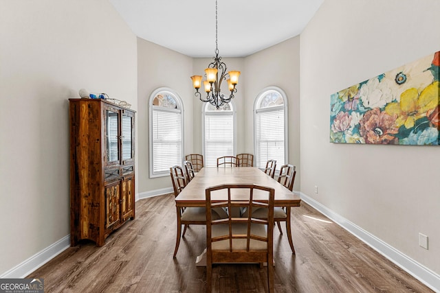 1452 Redwine Rd, Fayetteville, GA 30215 - dining area with a chandelier and wood finished floors