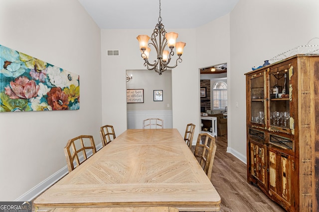 1452 Redwine Rd, Fayetteville, GA 30215 - dining space featuring a chandelier and wood finished floors