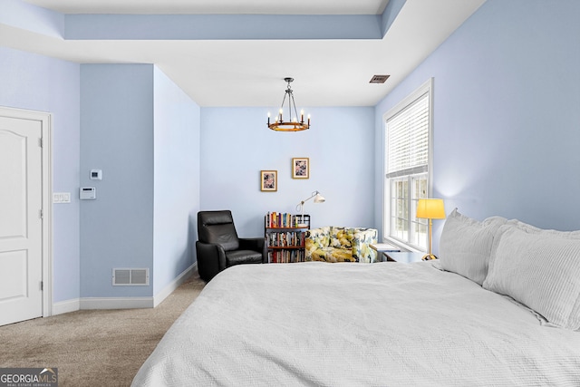 1452 Redwine Rd, Fayetteville, GA 30215 - bedroom with a chandelier and carpet flooring