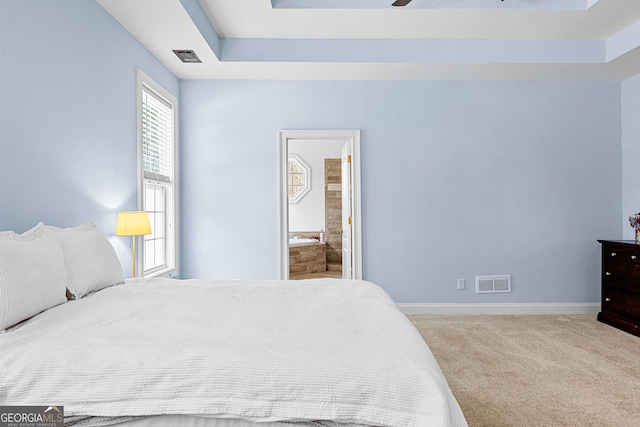 1452 Redwine Rd, Fayetteville, GA 30215 - bedroom with a raised ceiling, carpet floors, ensuite bathroom, and a ceiling fan