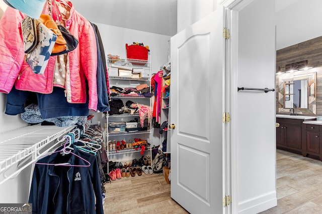 1452 Redwine Rd, Fayetteville, GA 30215 - walk in closet featuring light wood-style floors