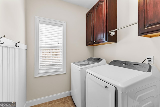 1452 Redwine Rd, Fayetteville, GA 30215 - laundry room featuring cabinet space and washing machine and clothes dryer
