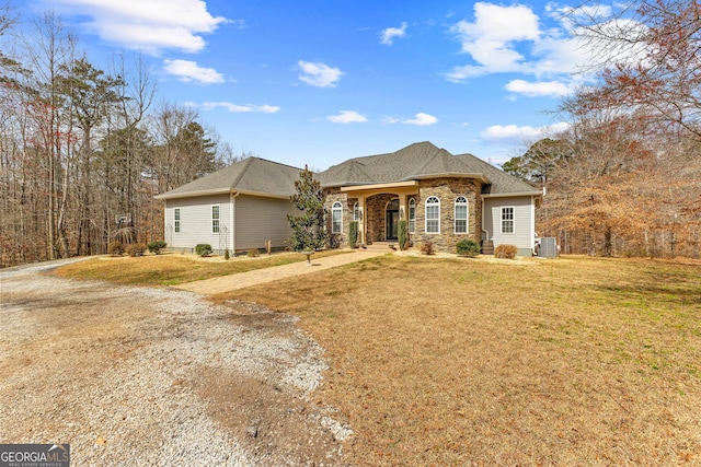 1452 Redwine Rd, Fayetteville, GA 30215 - view of front of home featuring a front lawn and roof with shingles