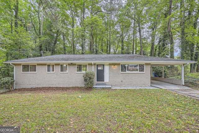 2184 Pemberton Rd SW, Atlanta, GA 30331 - view of front of house with concrete driveway, a front yard, an attached carport, and brick siding