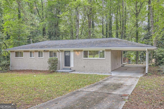 2184 Pemberton Rd SW, Atlanta, GA 30331 - single story home featuring driveway, a front lawn, brick siding, an attached carport, and a shingled roof