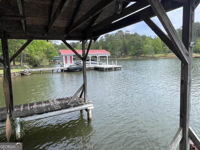 dock area featuring a water view