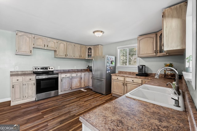 532 Henry Higgins Rd, Jackson, GA 30233 - kitchen featuring stainless steel appliances, a sink, dark wood-style flooring, glass insert cabinets, and light brown cabinets