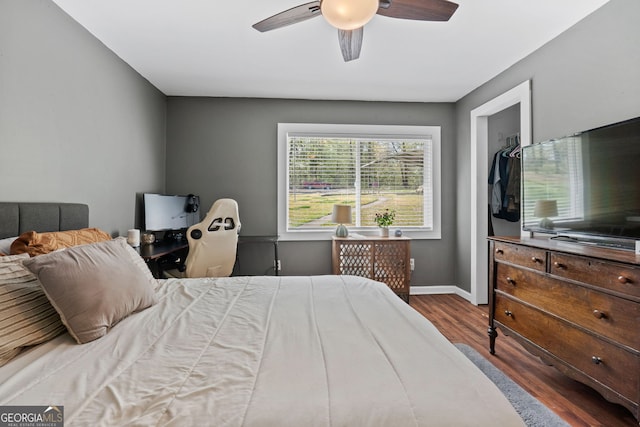 532 Henry Higgins Rd, Jackson, GA 30233 - bedroom with wood finished floors, baseboards, and a ceiling fan