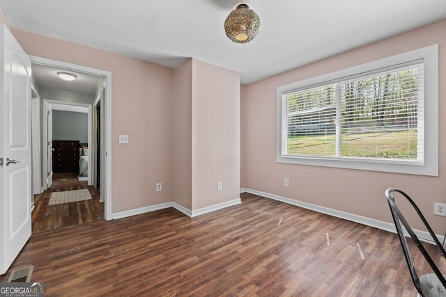532 Henry Higgins Rd, Jackson, GA 30233 - unfurnished bedroom with wood finished floors and baseboards