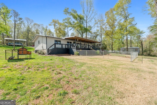 532 Henry Higgins Rd, Jackson, GA 30233 - view of yard with an outdoor structure and a wooden deck